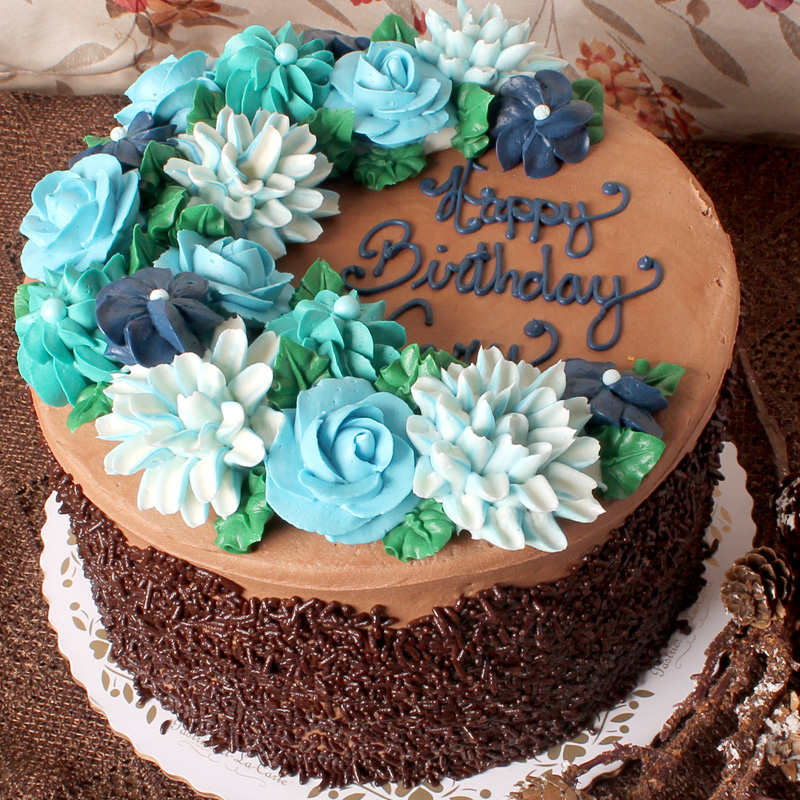 Blue Bouquet Over Chocolate Buttercream Cake