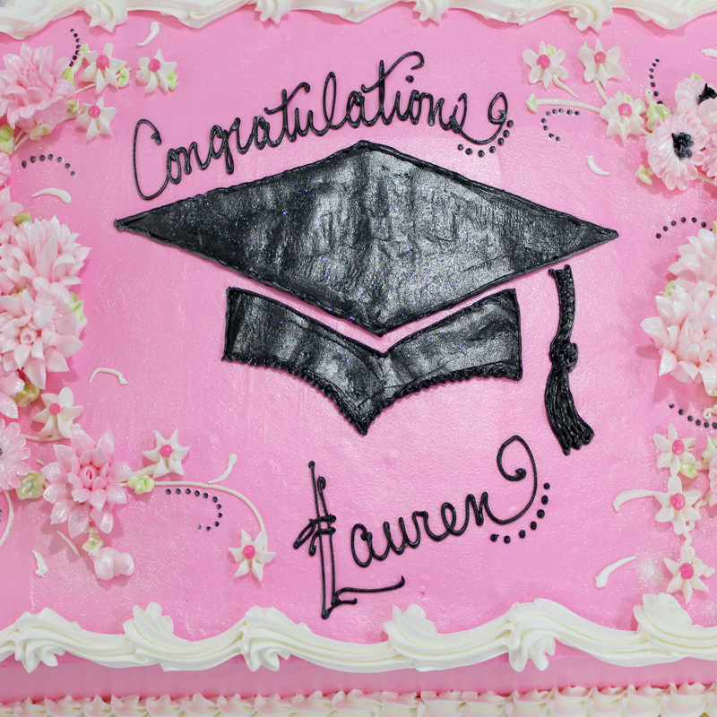 Colored Icing & Flowers Graduation Cake